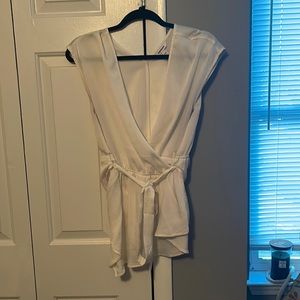 Express Ivory Wrap top with asymmetric hem